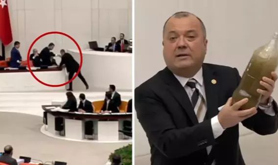 Meclis'te tansiyon yükseldi! Bakan Kurum, CHP'li vekilin getirdiği pis suyu yere fırlattı